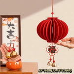 lanterne traditionnelle rouge papier plié relief cloches dorées pompons étiquettes chinoises décoration festive anniversaire