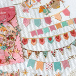 guirlande fanions imprimés floraux géométriques pois clips vert beige rose bleu vintage