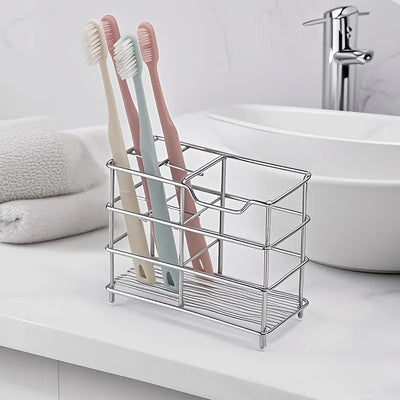 rangement moderne porte brosses dents tubes dentifrice acier inoxydable argenté pieds salle bain minimaliste