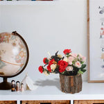 Arrangement de fleurs séchées dans pot en bois rustique
