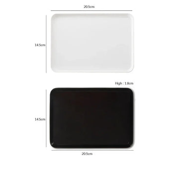assiettes plats modernes blanc noir cuisine rangement fruits desserts petit déjeuner