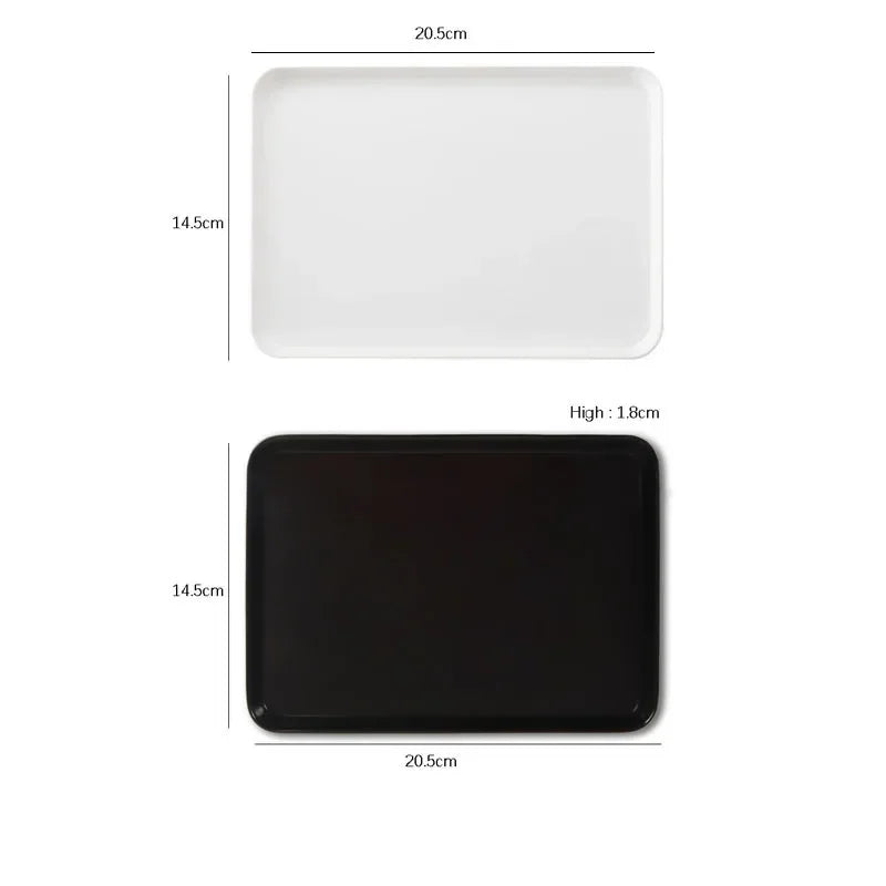 assiettes plats modernes blanc noir cuisine rangement fruits desserts petit déjeuner
