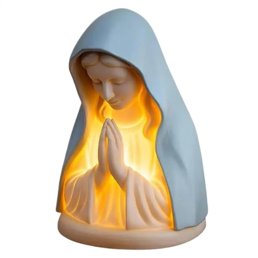 statue vierge marie prière lumière bleu blanc décor religieux table meuble bibliques bougies croix