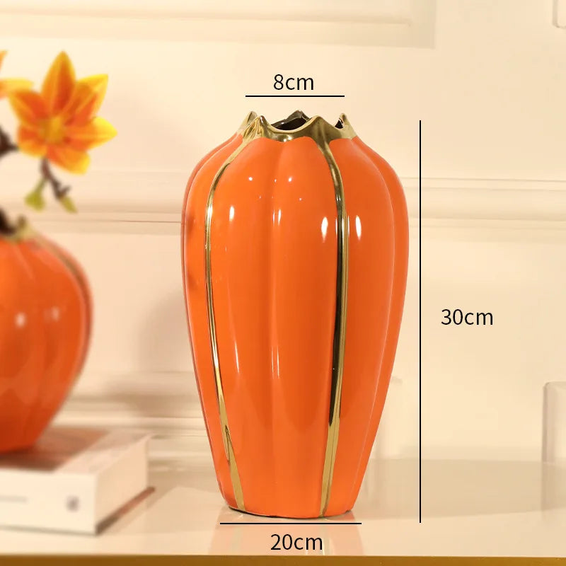 vase moderne élégant orange vert rayures bordure dorée fleurs artificielles décoration intérieure table salon