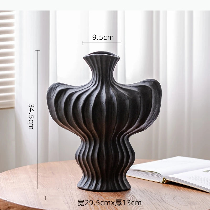 vase moderne céramique blanc noir rouge ondulé fleurs décoration intérieur salon