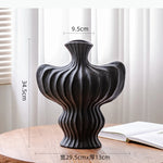 vase moderne céramique blanc noir rouge ondulé fleurs décoration intérieur salon
