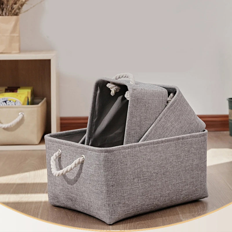 paniers rangement toile lin gris bleu rose beige pliables réutilisables moderne rustique poignées corde