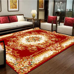 Un tapis épais et richement décoré de motifs floraux dorés sur un fond rouge éclatant, placé au centre d'un salon élégamment meublé.