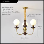 lustre classique doré noir sphères translucides structure métallique led salon chambrehôtel