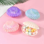 boîtes dragées forme coquillage violet vert rose blanc rayures horizontales moderne festives anniversaire dragées