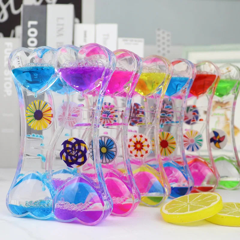 minuteur sablier liquide bicolore transparent motifs géométriques souriant deco moderne