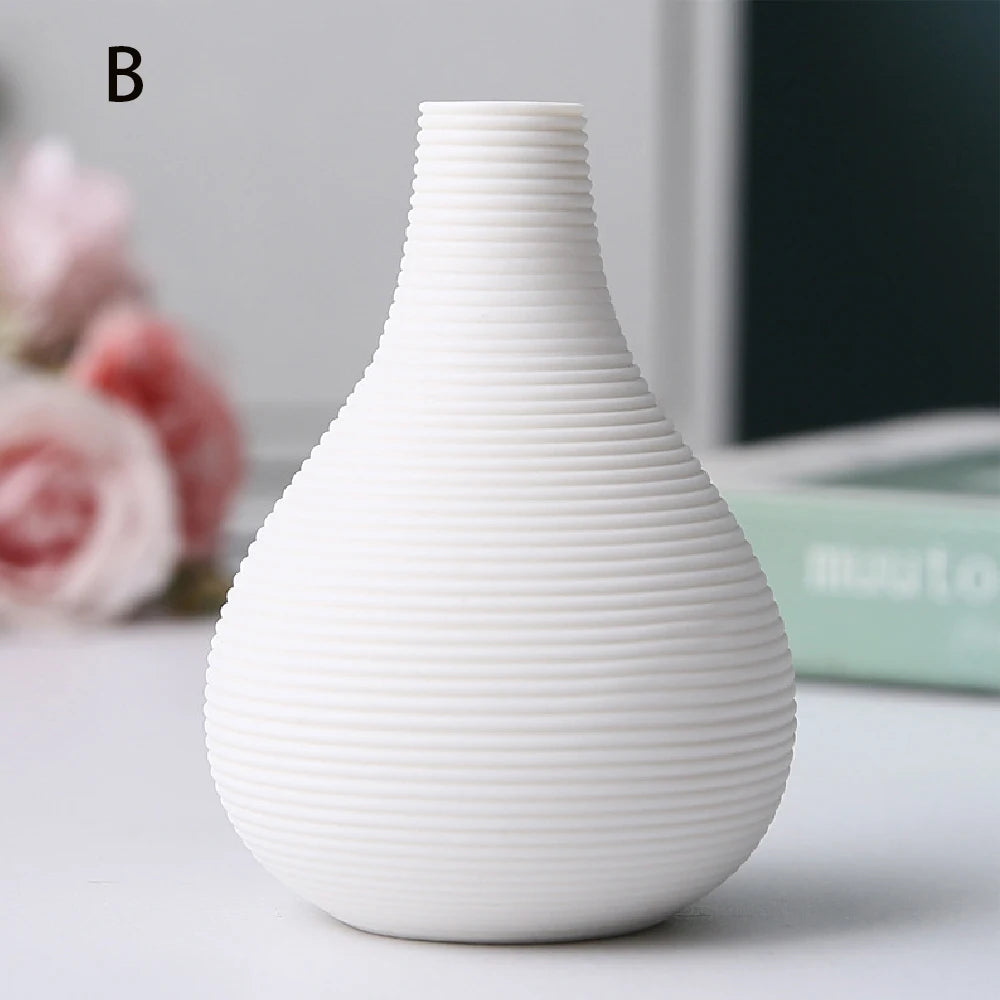 vases céramique noir blanc rayures modernes décoration intérieure plante verte minimaliste