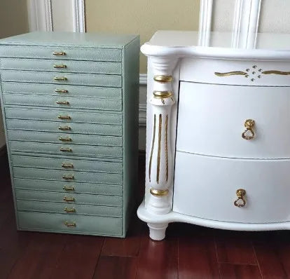 coffret bijoux moderne simili cuir noir blanc vert compartiments poignées dorées stockage sécurité