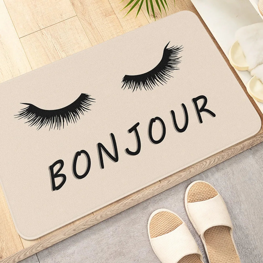 tapis d'entrée moderne yeux poupée welcome chiens os noir roseclair blanc