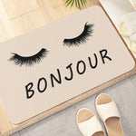 tapis d'entrée moderne yeux poupée welcome chiens os noir roseclair blanc