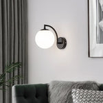 lampe murale moderne minimaliste noir doré éclairage cuisine entrée étude verre rond LEDflux lumineux