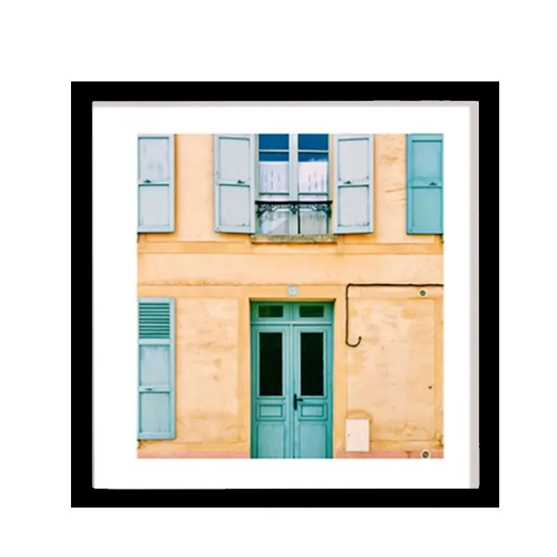 Cadre photo bois 20x20 cm accroché au mur