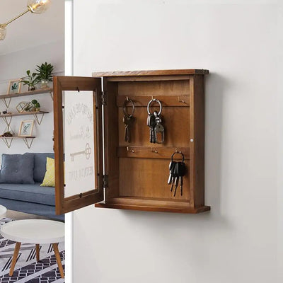 Boîte à clés murale en bois style européen vintage suspendue dans une entrée