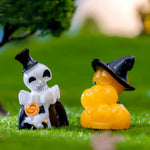 figurines halloween sorcière fantôme citrouille squelette résine noire blanche verte Jaune