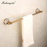 accessoires salle bain doré antique élégants détails floraux classiques porte serviettes double simple porte