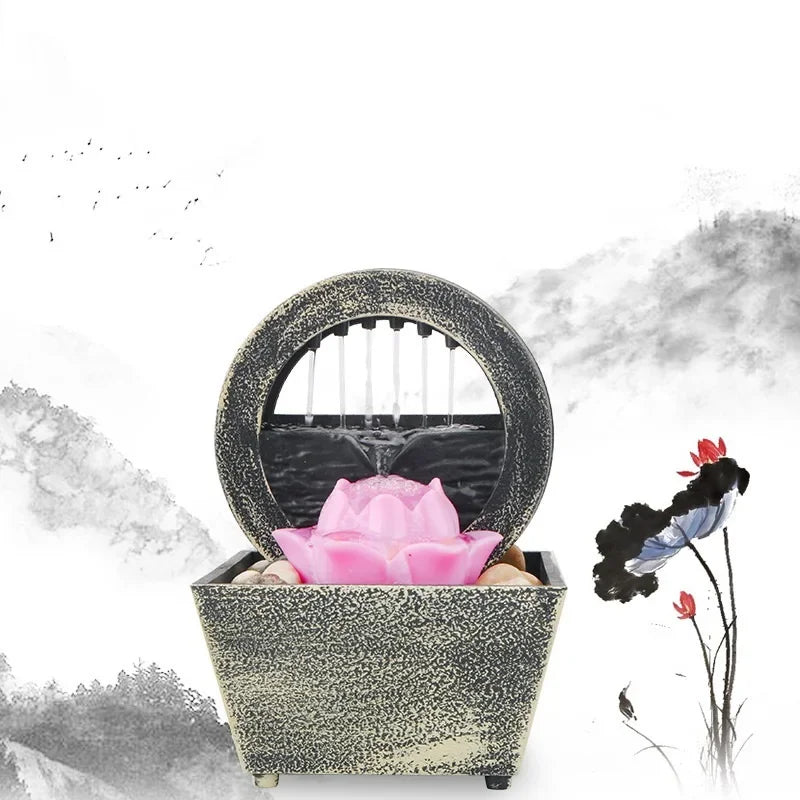 fontaine intérieure moderne fleur plante succulente éclairage led noir blanc pierres cascade décoration maison