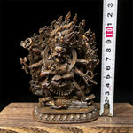 statue religieuse tibetaine bronze figurine details sculptés elements feu crâne base decorée poids indiqué