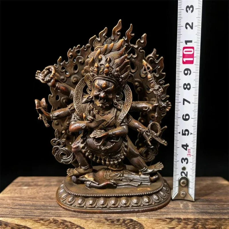 statue religieuse tibetaine bronze figurine details sculptés elements feu crâne base decorée poids indiqué