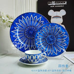 assiettes bleu motif floral tasse blanc classique opacité