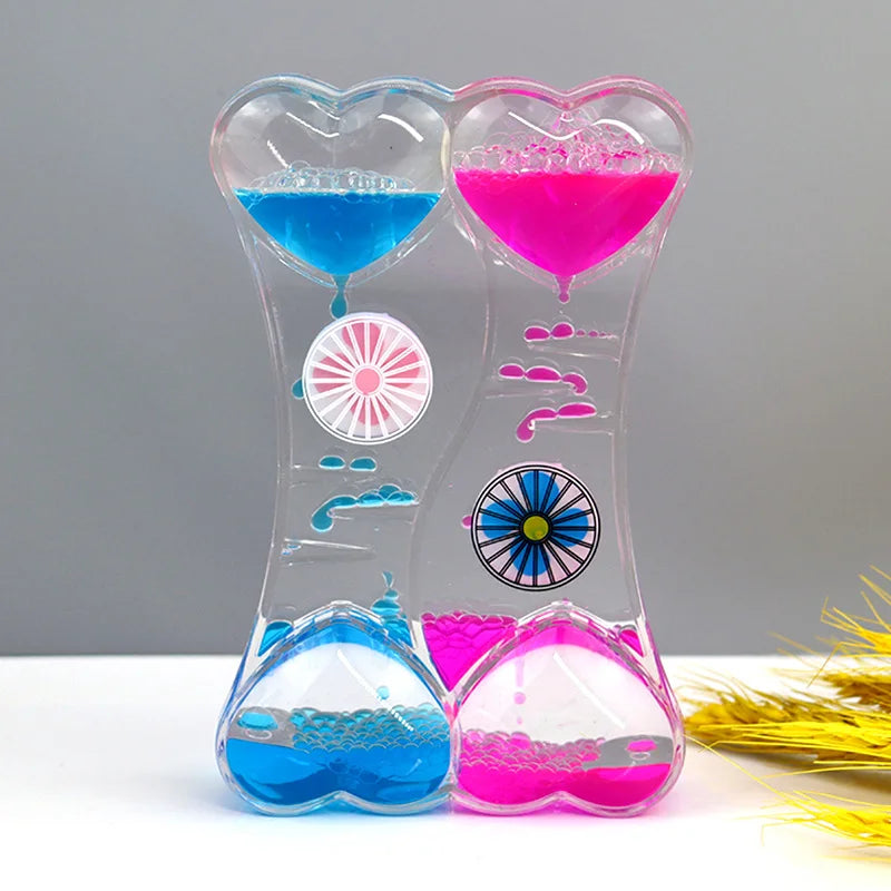 minuteur sablier liquide bicolore transparent motifs géométriques souriant deco moderne