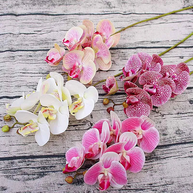 décoration intérieure orchidée papillon soie blanche rose élégante mariage fête prénuptiale moderne faux bouquet