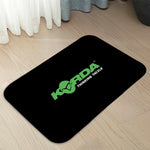 tapis moderne noir vert logo korda thinking tackle motif fleurs petite mousse pe polyester