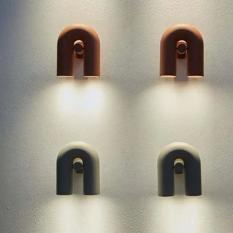 lampes murales modernes bleu turquoise noir blanc cassé rouille sculpturales éclairage quotidien minimaliste fixées