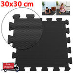 tapis sol noir puzzle géométrique moderne 30x30cm pack 16 pièces relaxation massage