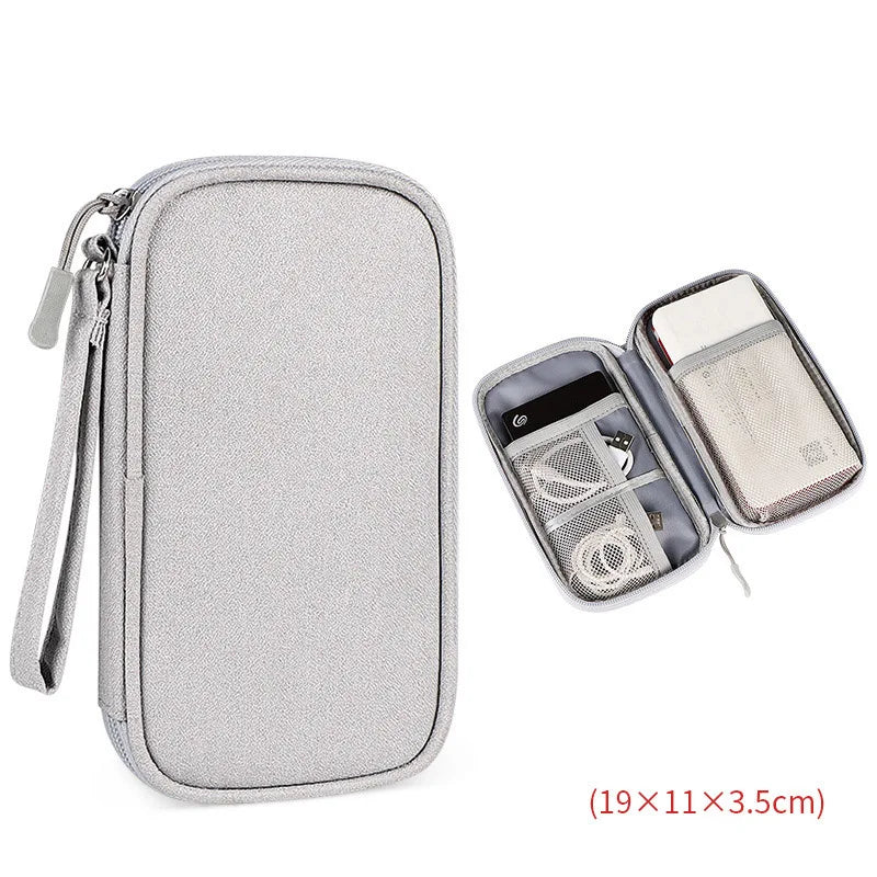 sac rangement accessoires tissu gris clair pratique ecouteurs cable usb chargeur voyage