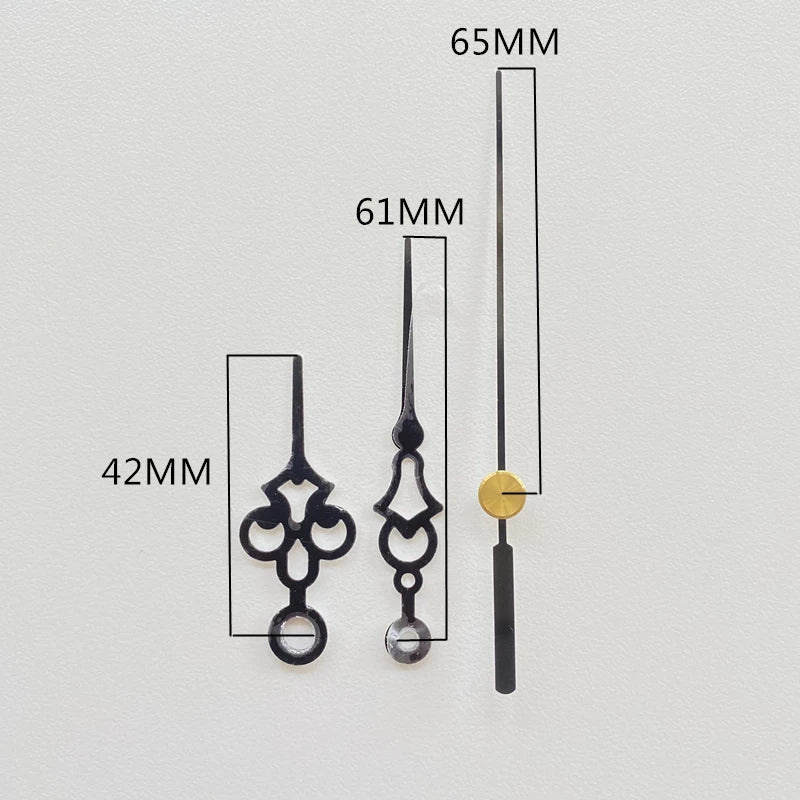 aiguilles horloge murales métal dorées noires blanches rouges modernes élégantes mouvement quartz fixations remplacent