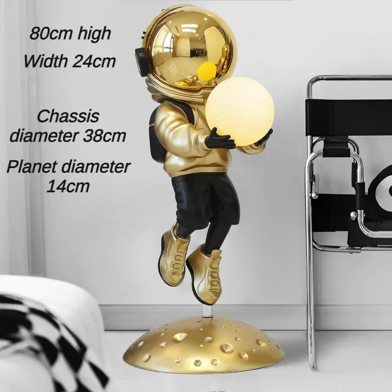 statuette astronaute résine couleur changeante doré argenté rose jaune moderne brillant métallique fixations