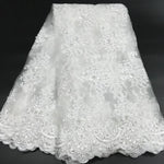 tissu dentelle polyester blanc noir floral translucide élégant mariage robes