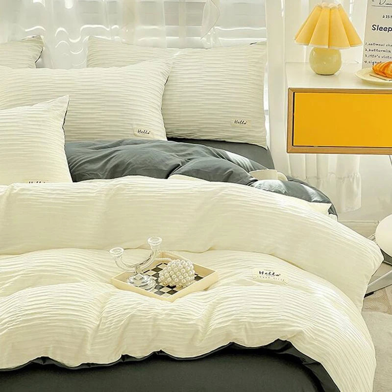 Ensemble housse de couette et taies d'oreiller en couleur blanc