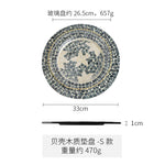 assiettes verre mosaïque bordure dorée relief blanc gris bleu élégantes restaurant decoration