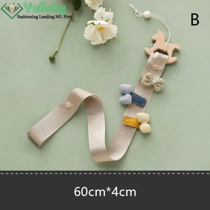 porte accessoires mural moderne rubans clips cheveux motifs floraux pois arc ciel nuages papillons