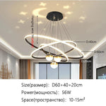 suspension lumineuse moderne or blanc anneaux superposés intérieur chambre salon