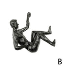 statues métal noir sculptures humaines diverses postures art moderne decoration murale