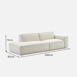 canapé d'angle moderne beige clair uni confortable salon minimaliste inclusion coussins tapis