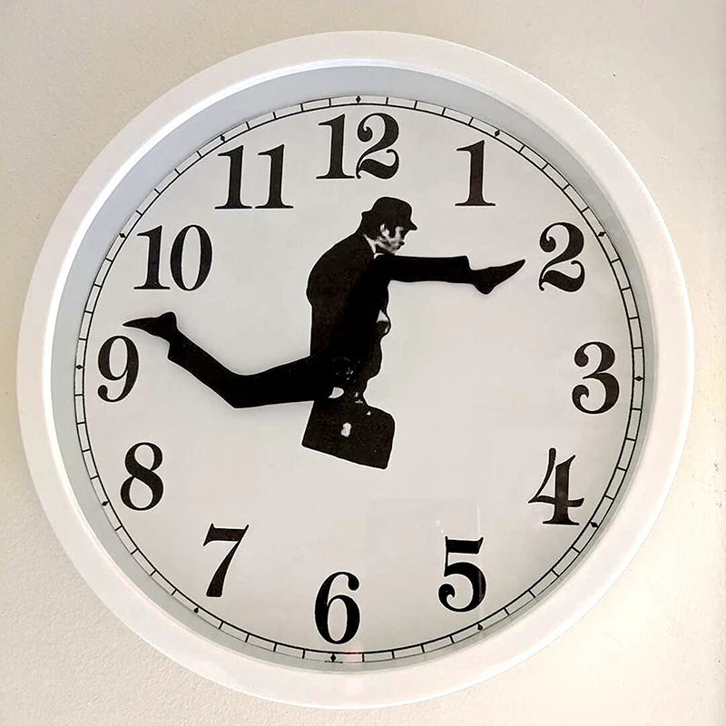 horloge murale moderne cadre noir fond blanc motif homme costume