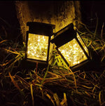 lanterne solaire cuivre noir filet lumineux moderne extérieure jardin cour patio tringle