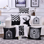 housse coussin coton noir blanc motifs géométriques animaux moderne minimaliste scandi