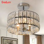 lustre moderne élégant transparent strass argenté noir doré éclairage intérieur salle manger couloir