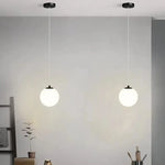 suspension lumineuse pendentif verre blanc structure dorée éclairage moderne chambre étude