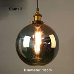 suspension lumineuse industrielle vintage ampoule filament verre transparent noir salon restaurant bar