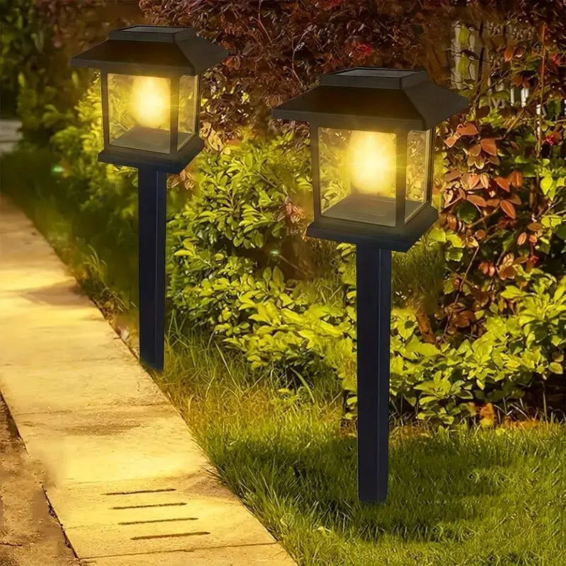lampes solaires autonomes noires transparentes modernes jardin cheminées fixations piquets flux lumineux nocturne